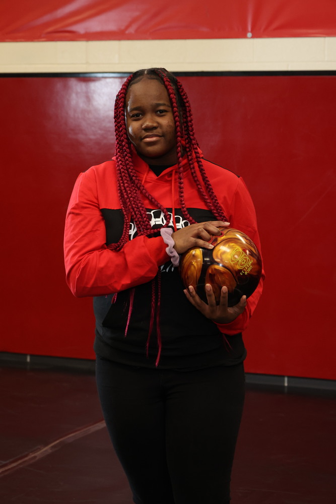 Khadijah Thompson holding a bowling ball